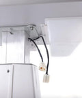 Underside view of the Motorized Instrument Lift For Optometry Working Table With Adjustable Height And Rolling Stand showing wiring details.