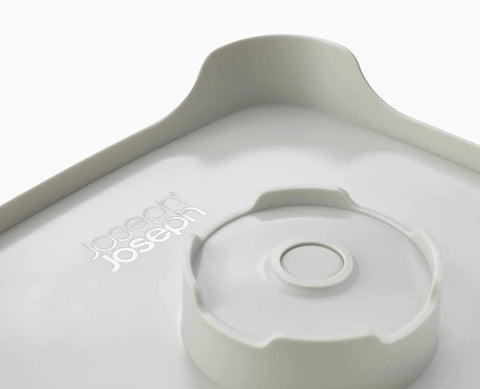 Close-up of Wash And Drain Kitchen Dish Tub With Handles And Twist Drain Plug 9 Liter Basin, focus on built-in plug and strainer detail