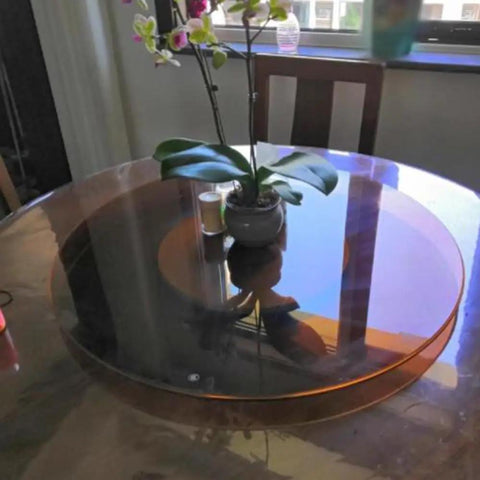 Heavy Duty Tempered Glass Lazy Susan Turntable For Dining Tables 40 Inch on dining table with flower vase and decor.