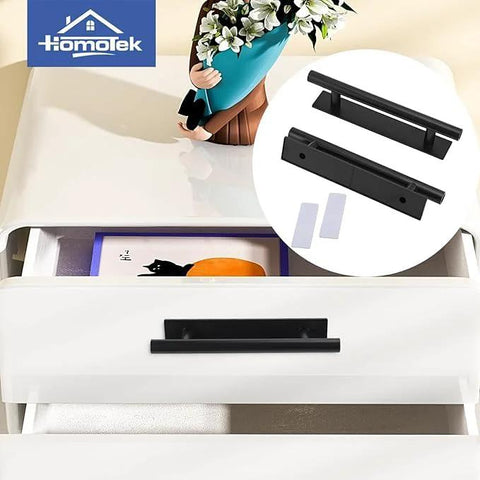 Six Pack Plastic Adhesive Cabinet Handles installed on white drawer, showing black 5.9 inch handles with no drill damage free installation.