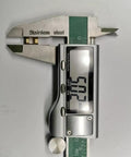 Digital caliper measuring 60.02mm, made of stainless steel for precise measurements in mechanical projects.