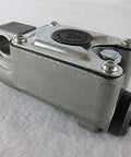 Side view of UFP by Dexter A-60 brake actuator master cylinder for drum brakes, metallic body with black cap.