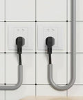 Low Profile Gray Floor Cable Cover And Durable Pvc Wire Protector With Anti Slip Cord Hider for tight home office setups around outlets.