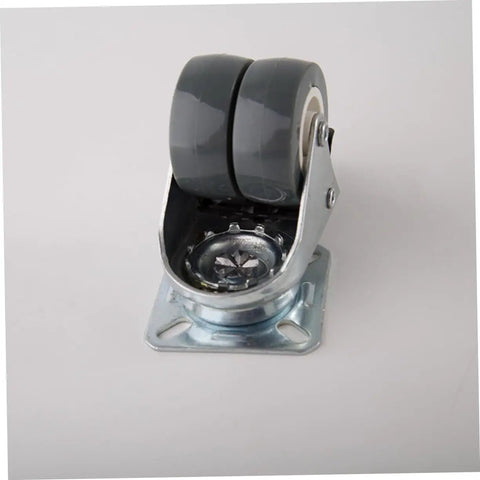 Built Tough Heavy Duty Twin Caster Wheels With Locking Brake 360 Degree Swiveling Premium Furniture Rollers close-up view with iron mounting plate.