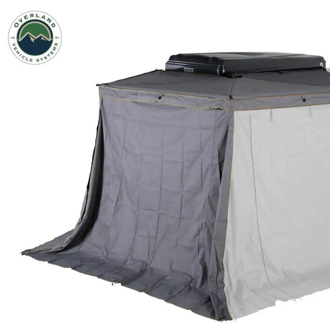 Hella Rugged Partner Side Awning Wall To Keep Your Trail Campout Rig Shade Covered features granite gray and lime green accents.