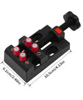 Compact Bench Vise Clamp With Handy Ergonomic Handle And Precision Mechanism, Flat Opening For Watch Repair, Jewelry Making, Sculpture And DIY Projects, Locking System, Small Vise Tool For Crafts And Electronics. Black 10.5cm bench vise with red clamp posts and handle