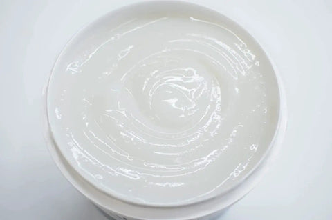 Top view of Heavy Duty Clear Wallpaper Adhesive with Extra Tack for Vinyl and Nonwoven Wallpapers Non Staining Formula 1 Gallon.
