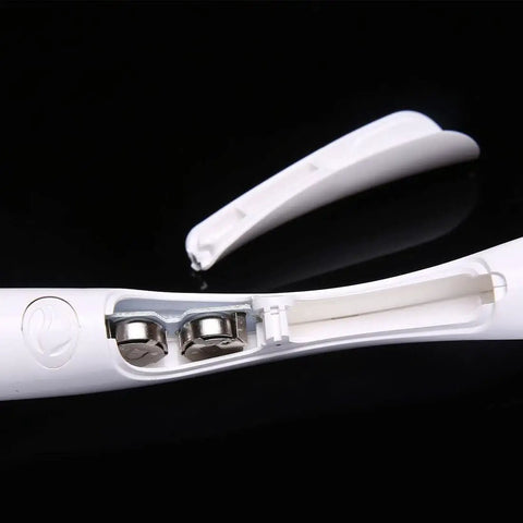 Close-up of battery compartment in Latte Art Electric Pen For Coffee And Dessert DIY, showing the battery slots and cover.