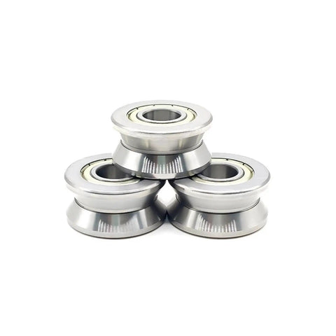 Two Piece V Groove Linear Bearing Replacement With Precision Steel Rollers For Frictionless Shaft Guidance And Steady Rotation In Automation Gear Sized At Twelve By Thirty Nine Point Nine By Eighteen Millimeters stacked view of steel rollers.