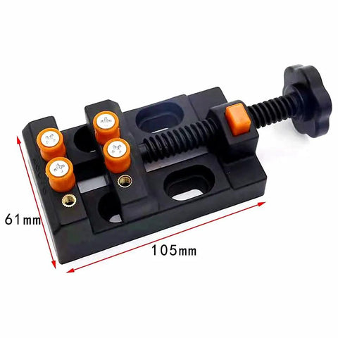 Mini vise clamp from 18-Piece Stone Carving Kit With Manganese Steel Chisels, measuring 105mm x 61mm, designed for precise engraving.