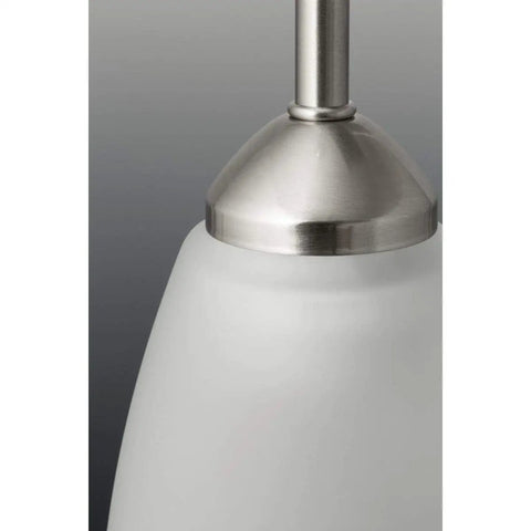 Close-up of etched glass shade and brushed nickel finish of Gather Collection 4-Light Etched Glass Bath Vanity Light In Brushed Nickel Dope Traditional Style Fixture With Classic Cup Shades Easy Install Durable Build Perfect For Powder Rooms And Bathrooms.