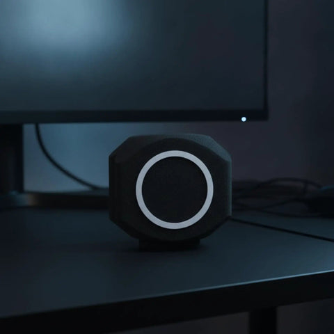 Total Game Changer Acoustic Foam Mic Windscreen Pop Filter Stops Plosives Kills Background Noise For Podcasting Streaming And Home Broadcast Perfectly Shields Your Mic With Thick Black Foam Cover on a desk with computer monitor