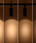 Six Pack 16.5W Dimmable LED Track Lighting Heads, 1200lm Each, 24 Degree Beam demonstrating light patterns, black finish.