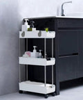 Sleek 3 Tier Slim Rolling Storage Cart With Slide Out Shelves For Tight Squeezes showing white shelves filled with bathroom essentials
