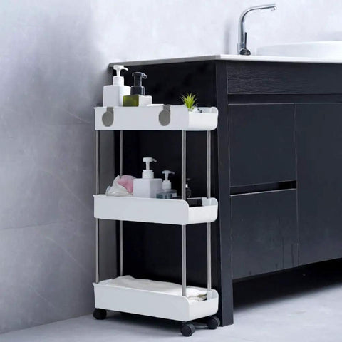 Sleek 3 Tier Slim Rolling Storage Cart With Slide Out Shelves For Tight Squeezes showing white shelves filled with bathroom essentials