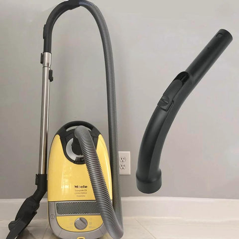 Miele Vacuum Handle Grip Tube Replacement For 35 Mm And 47 Mm Diameters, Compatible With C1 C2 C3 S Series, shown next to vacuum