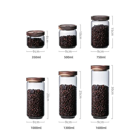 Top Shelf Airtight Glass Storage Jars With Smooth Acacia Wood Lids Keeps Your Daily Drip Locked Up Tight For Coffee Beans Tea And Dry Goods In This Bpa Free Four Pack Kitchen Essential, various sizes with beans.