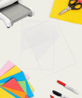4 Pack Transparent Die Cutting Pads For Scrapbooking Machines, 8.75 x 6 Inch Clear Polycarbonate Cutting Plates on desk