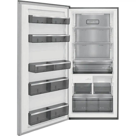 Interior view of a spacious refrigerator featuring adjustable shelves, transparent bins, and a frost-free design.