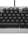 Goat Tier Compact Tenkeyless Mechanical Gaming Keyboard Featuring Cherry MX Red Switches For Hella Rapid Key Taps And A Clean Workstation Layout That Truly Slays During Marathon Sessions on a metal frame.