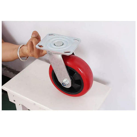 Red Polyurethane Swivel Caster Wheels 3 Inch Heavy Duty Ball Bearing Casters side view on a table for furniture and display use.