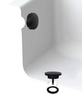 Standard 1.5 Inch Cable Drive Bath Drain Replacement Trim In Slick Matte Black, installed in bathtub with overflow control and stopper.