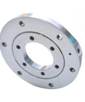 Premium Crossed Roller Bearing Kit For Robot Indexing Table Turntable Mounts Featuring Needle Bearing For Rock Solid Motion and Killer Durability Performance - top view of metal bearing with central hole and mounting holes.