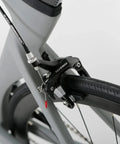 Close-up of rear brake system on the Toray T800 Carbon Frame Road Bike Model H With Tiagra 20 Speed Drivetrain, Celeste Finish