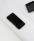 Close-up of Five Pack Invisible Flush Drawer Pull Handles Matte Black Zinc Alloy Hidden Cabinet Pulls on a white surface.