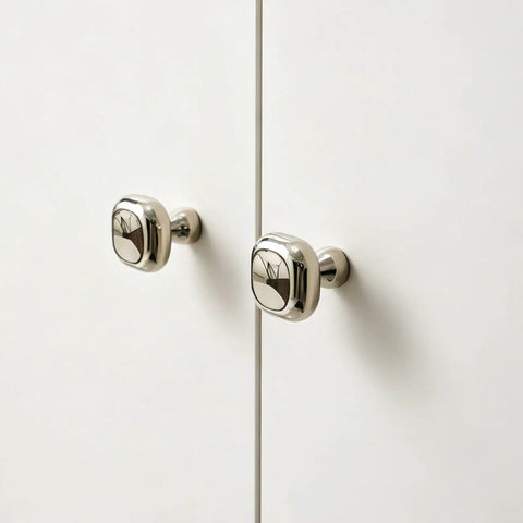 Slick Silver Cabinet Knobs and Drawer Pulls Set, Polished Zinc Alloy With Titanium Coating on white cabinet