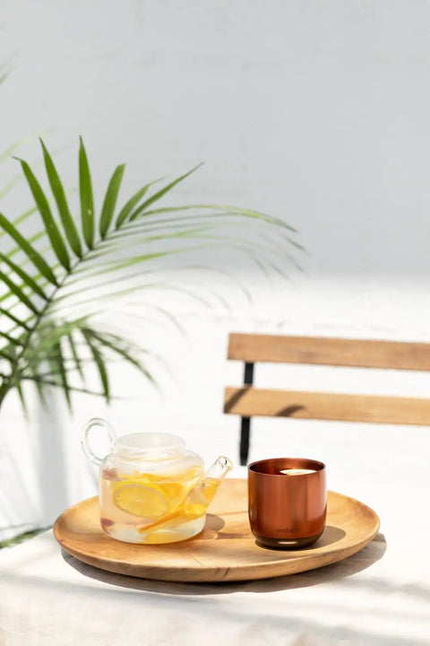 Renewed 6 Oz Smart Heated Coffee Mug With App Precision Temp Control And Solid Battery Life Keeps Your Favorite Brew Piping Hot And Ready For All Day Sipping Sessions on a wooden tray with a glass teapot.