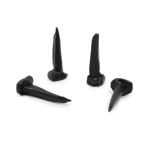 Solid As A Rock Half Inch Black Steel Upholstery Tacks To Nail Down Muslin And Fabric Covers Smooth Dome Heads shown from various angles.