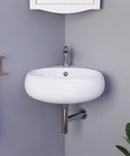 Corner Wall Mounted Bathroom Sink White 14.5 Inch with Overflow, Space Saving Basin in modern bathroom setting