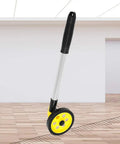 Semme WS 202 C2 Handle High Visibility Measuring Wheel with yellow wheel and aluminum handle on wooden floor.