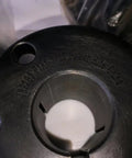 Close-up of H Type Pulley Bushing showing size and precision cuts, part of Shop Verified H Type Pulley Bushing Yields Dead On Alignment.