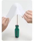 Hands holding a white membrane over a green screwdriver, showing flexibility of the Straight Up Heavy Duty Polyethylene Waterproof Membrane Roll For Roofing Felt Underlayment Built Tough To Handle Daily Grind Without Failing Keeps Water Locked Out On Any Project.