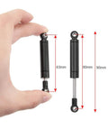 Hand holding Beefy Metal RC Shock Absorber Damper 80mm with Internal Spring for One Tenth Scale RC Crawlers