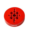 Red metal plate for beefy telescope mount clamp dovetail saddle adapter with multiple holes for secure connection.