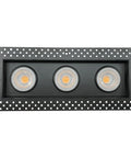 Slick Black 4 Inch Rectangular Trimless Triple Head Gimbal Downlight with three heads and a perforated frame design.