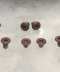 Kick Ass Copper Powder Coated Torx Screw Set showing ten copper screws for heavy duty everyday carry rigs.