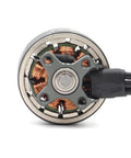 Close-up of 4300KV 1506 Brushless Motor For 4 To 6S FPV Drones Titanium Pink Finish showing copper windings.