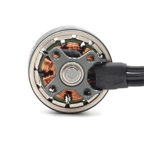 Close-up of 4300KV 1506 Brushless Motor For 4 To 6S FPV Drones Titanium Pink Finish showing copper windings.