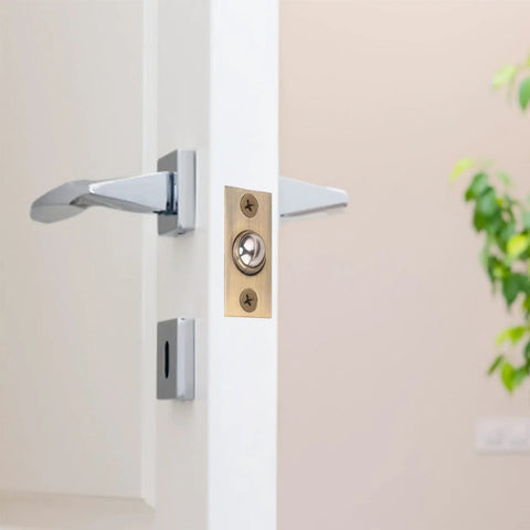 Stunning Golden Roller Latch With Adjustable Tension For Closet Cupboard Door Hidden Beads Lock Hardware on white door.
