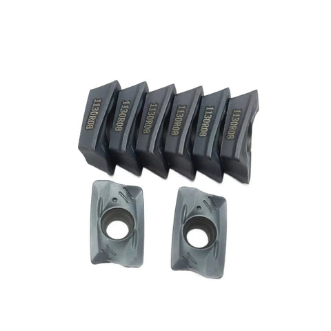 Durable Indexable Carbide Lathe Tool R390 11T308 PM For Turning Steel And Stainless, six inserts on white background.