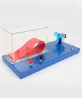 Airplane Lift Principle Demonstrator Hands On Physics Mechanics Lab Kit with wing model, blower, and base on a blue platform.