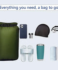 Ultimate Five Pack Waterproof Dry Sack Set in green with outdoor gear like phone, earbuds, cap, goggles, mug, and towels.