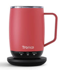 No App Hassle Self Heating Coffee Mug With Precise Temperature Control, 14 Oz Travel Cup in rose finish on charging base.