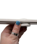 Side view of Dishwasher Lower Spray Arm Replacement W10319027 WPW10319027 AP6019436 PS11752743 in hand showing size and design detail