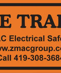 IE Trap safety label by ZMAC Electrical Safety LLC featuring contact information and website on bright orange background.