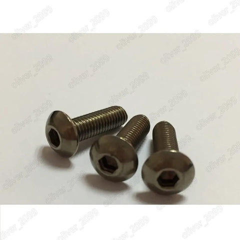 Premium Grade Two Titanium Button Head Hex Socket Screws Built Like A Tank For Marine And Medical Work Biocompatible Saltwater Proof Size 3 By 50mm Precision Pack Of Fifty Pieces viewed from the side showing three screws.
